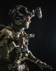 Army special operations soldier, security service fighter, commando shooter equipped modern...
