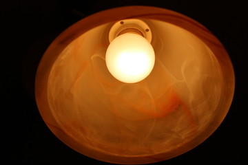 Lamp in the dark. Chandelier. Lighting in the room