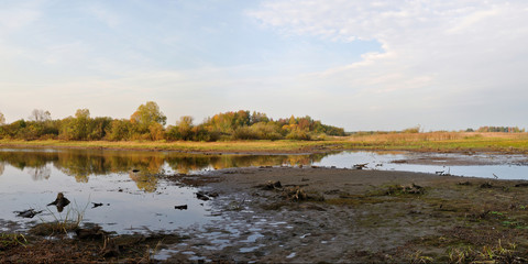 Autumn fishing on the Rybinsk Reservoir, beautiful panorama.