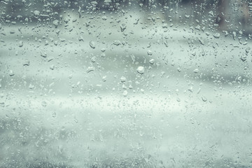 drops of rain on the glass, bad weather, a window after the rain