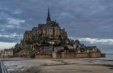 The magnificent medieval abbey of Mont Saint-Michel (France) exudes history, beauty and magic alike , Concept tourism.