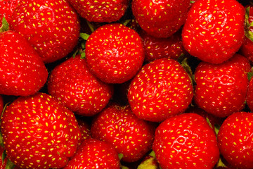 Ripe strawberries closeup. Background, textures