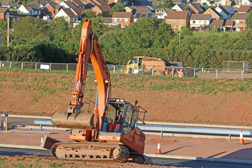 Digger on a road construction site	