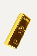 High grade gold bullion bar. Isolated on white.