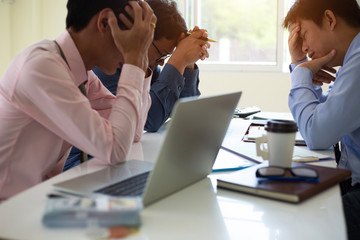 business team is stressed about the budget calculation to pay taxes.concept