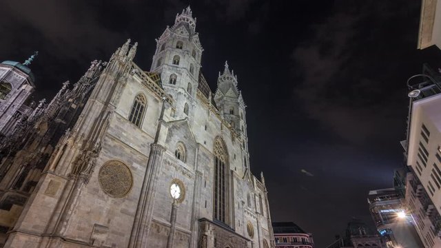 St. Stephen's Cathedral night timelapse hyperlapse (Stephansdom, Domkirche St. Stephan), the mother church of Roman Catholic Archdiocese of Vienna and one of the tallest churches in the world