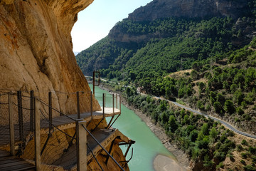 Wooden boardwalk clinging to the mountainside, part of El Caminito del Rey, once the world's most dangerous footpath