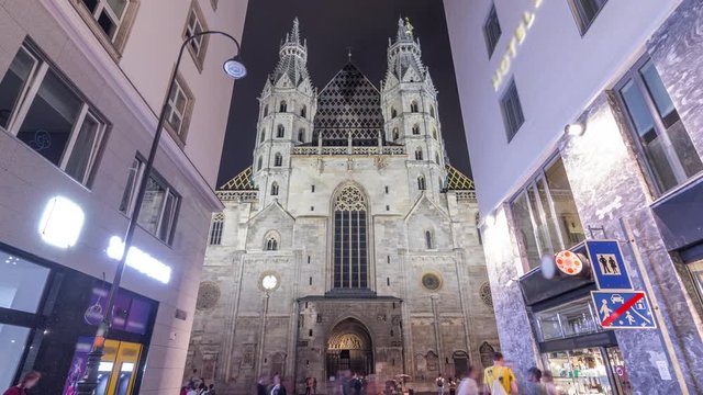 St. Stephen's Cathedral night timelapse hyperlapse (Stephansdom, Domkirche St. Stephan), the mother church of Roman Catholic Archdiocese of Vienna and one of the tallest churches in the world