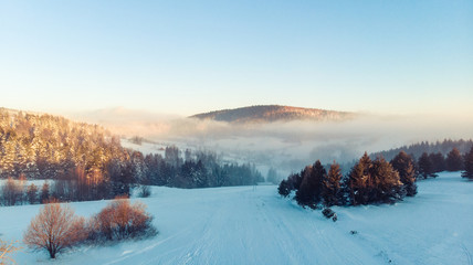 Cold Morning at Winter Season with Hoar Frost over Trees