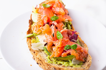 toast with salmon avocado, lettuce