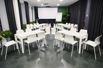 photo of office or conference room with white office furniture