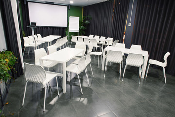 photo of office or conference room with white office furniture