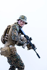 Fototapeta premium soldier in action aiming laseer sight optics