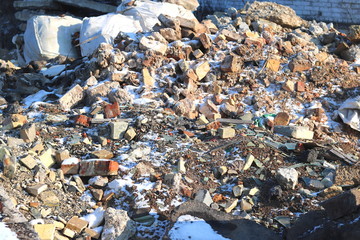 Construction waste with elements of various dismantled and destroyed old structures at municipal...