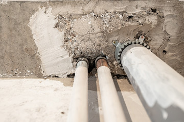 Heating pipes in new house, dismantling and repair of holes in concrete floors, noise and sounds of...