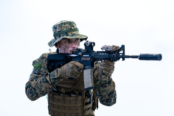 Fototapeta premium soldier in action aiming laseer sight optics