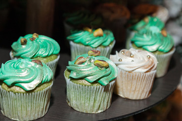 Tasty mini cakes of different flavors for the celebration.