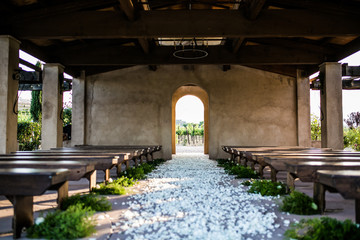 Fototapeta premium rustic outdoor wedding chapel in vineyard