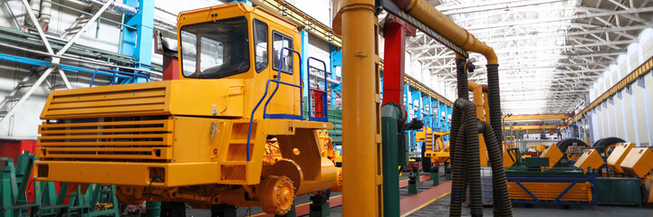 Half ready heavy truck standing at the end of production line.