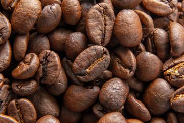 Texture of roasted ready to drink coffee close-up. Coffee Beans background. Top view