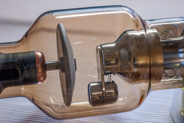Vacuum glass ampoule of an X-ray Tube Soruce, with visible filament