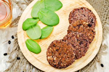 black beans brown rice walnut oat burgers with spinach