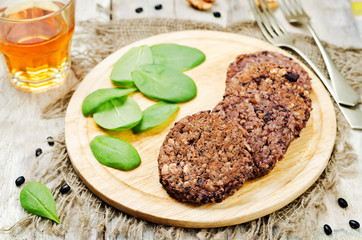 black beans brown rice walnut oat burgers with spinach