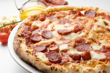 pizza with salami on the white background