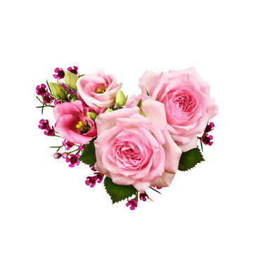 Pink rose flowers in a heart shape arrangement