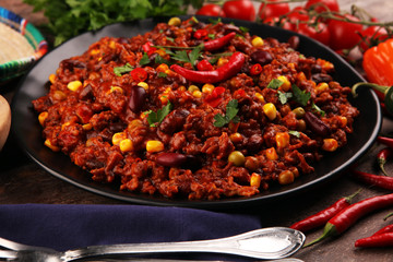 Hot chili con carne. mexican food tasty and spicy wit beans