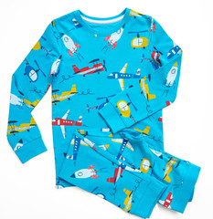 Sleepwear set for a toddler boy on white background. Shirt and pants made of blue pattern cotton...