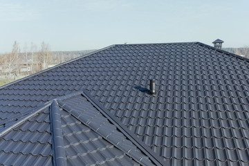 Corrugated metal roof and metal roofing. Modern roof made of met