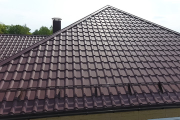 Corrugated metal roof and metal roofing. Modern roof made of met