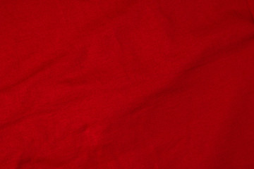 red crumpled texture fabric top view