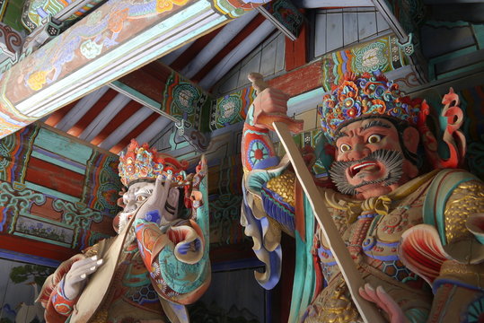 two Guardian Demons at the Gates of Buddhist Temple in Sinheungsa Seoraksan National Park, South Korea
