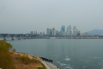 skyline Seoul with bridge and skysrapers in the back while shore in the front, South Korea, Asia