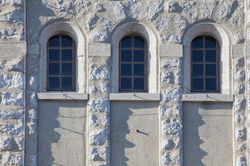 three windows on wall