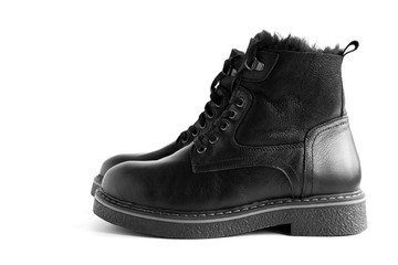 isolated black leather women's winter boots with laces and fur