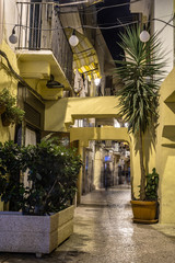 Fototapeta na wymiar Night view of historical buildings and streets in Bari, Italy