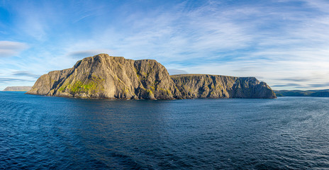 View to cliffs of north cape from sea view in summer