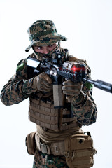 soldier in action aiming laseer sight optics