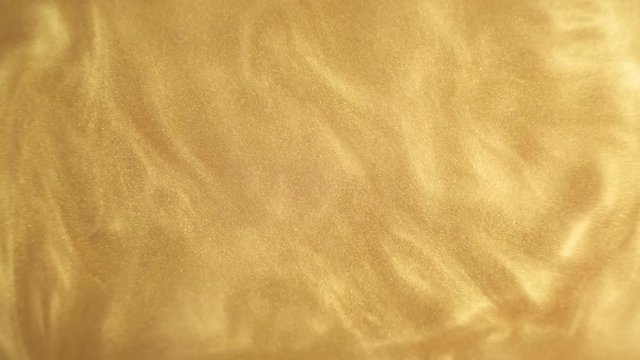 Rheoscopic fluid. Beautiful movement of particles in a liquid. Fantastic patterns and shapes.
