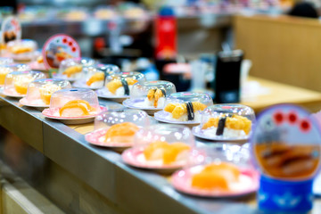 Fresh sushi rolls in an asian food store
