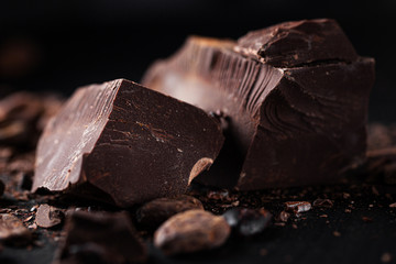 Dark chocolate chunks on table
