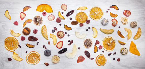 panoramic composition of dried fruits on a white background