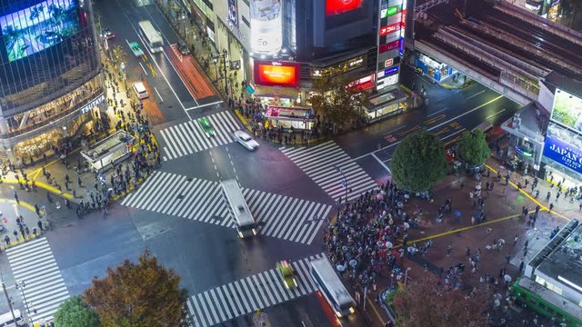 Elevated time lapse of crowds crossing the famous Shibuya Crossing, Shibuya, Tokyo, Japan
