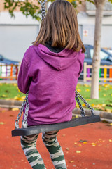 Little girl posing in park