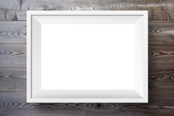 White photo frame on dark wood background