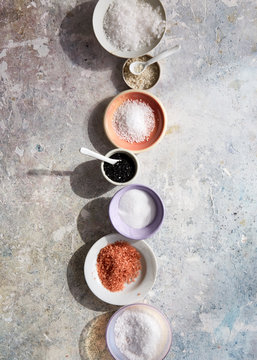 A variety of salts in dishes
