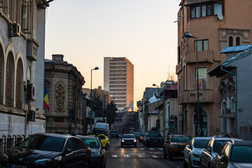 Car traffic on the main boulevard in Bucharest downtown. Winter morning/evening rush hour in...
